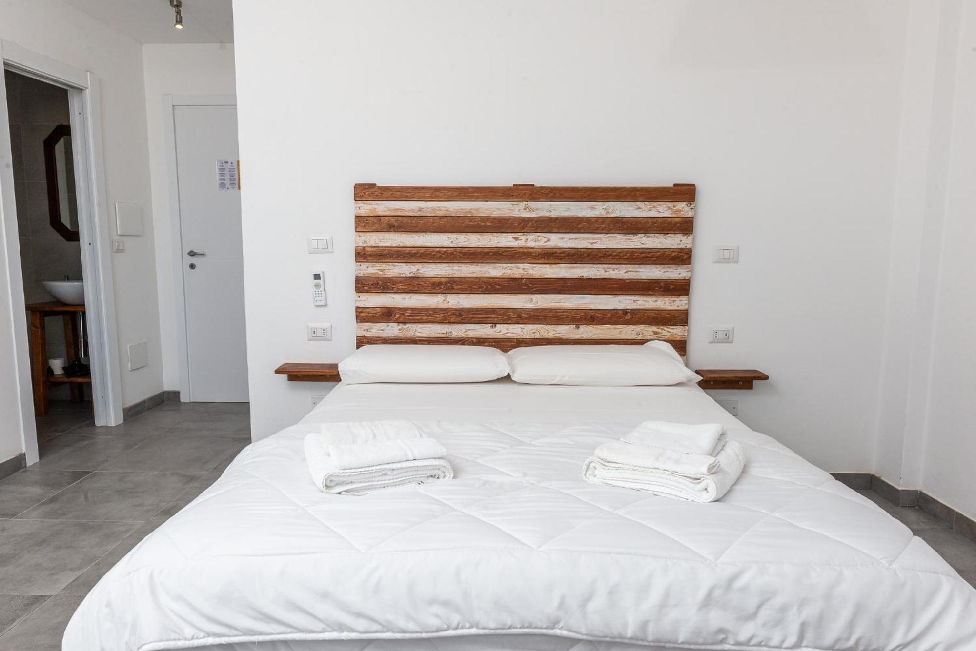 Guest House - Affittacamere Green Apartment - By Faendho Porto Torres Buitenkant foto
