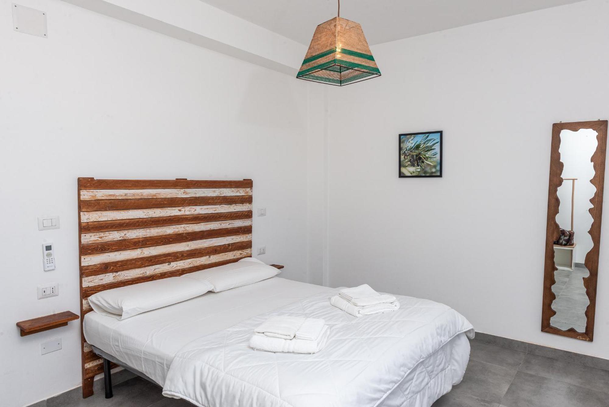 Guest House - Affittacamere Green Apartment - By Faendho Porto Torres Buitenkant foto