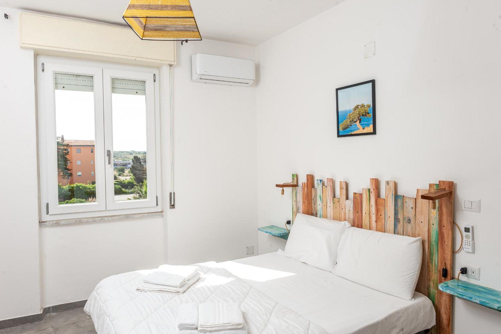 Guest House - Affittacamere Green Apartment - By Faendho Porto Torres Buitenkant foto