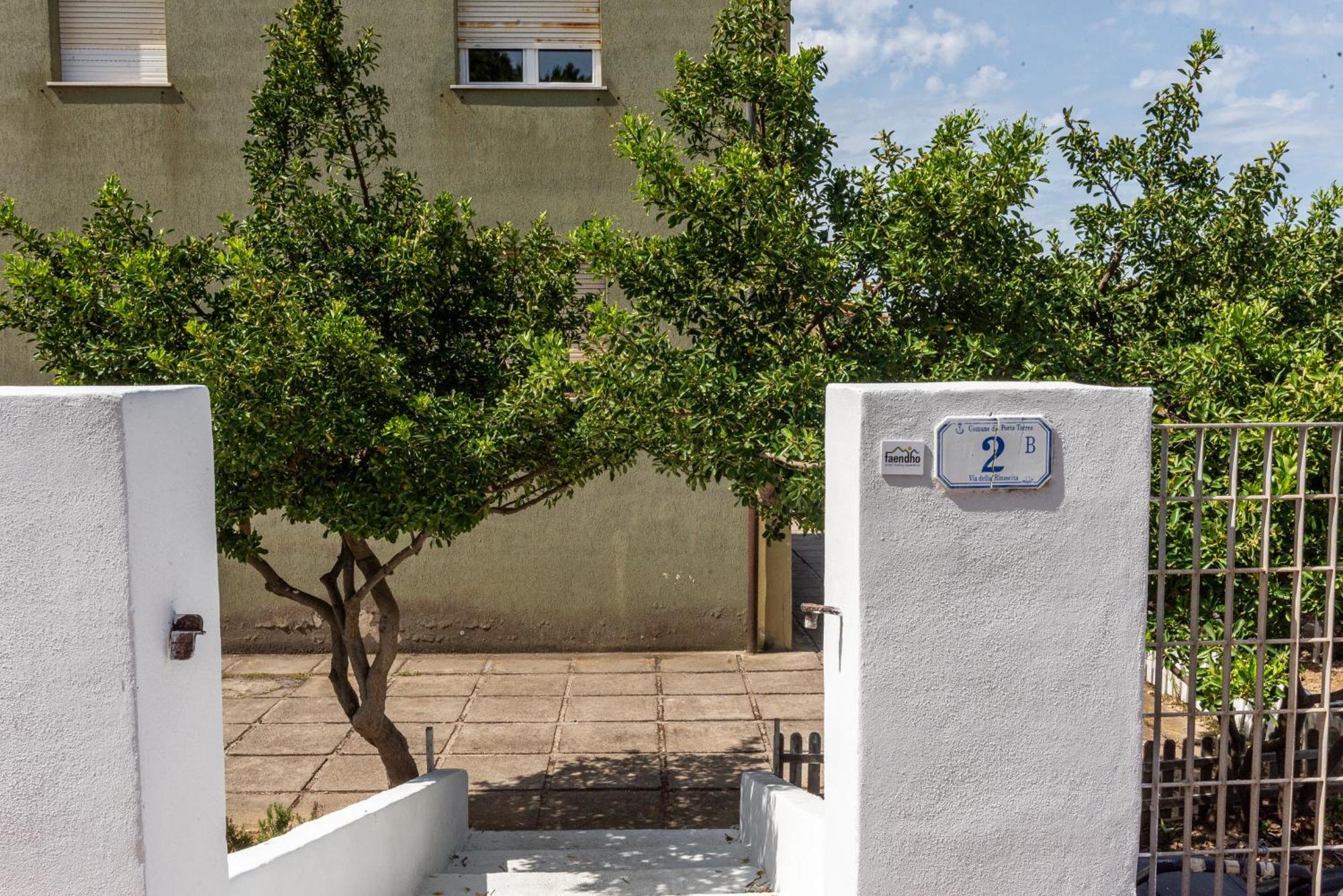 Guest House - Affittacamere Green Apartment - By Faendho Porto Torres Buitenkant foto