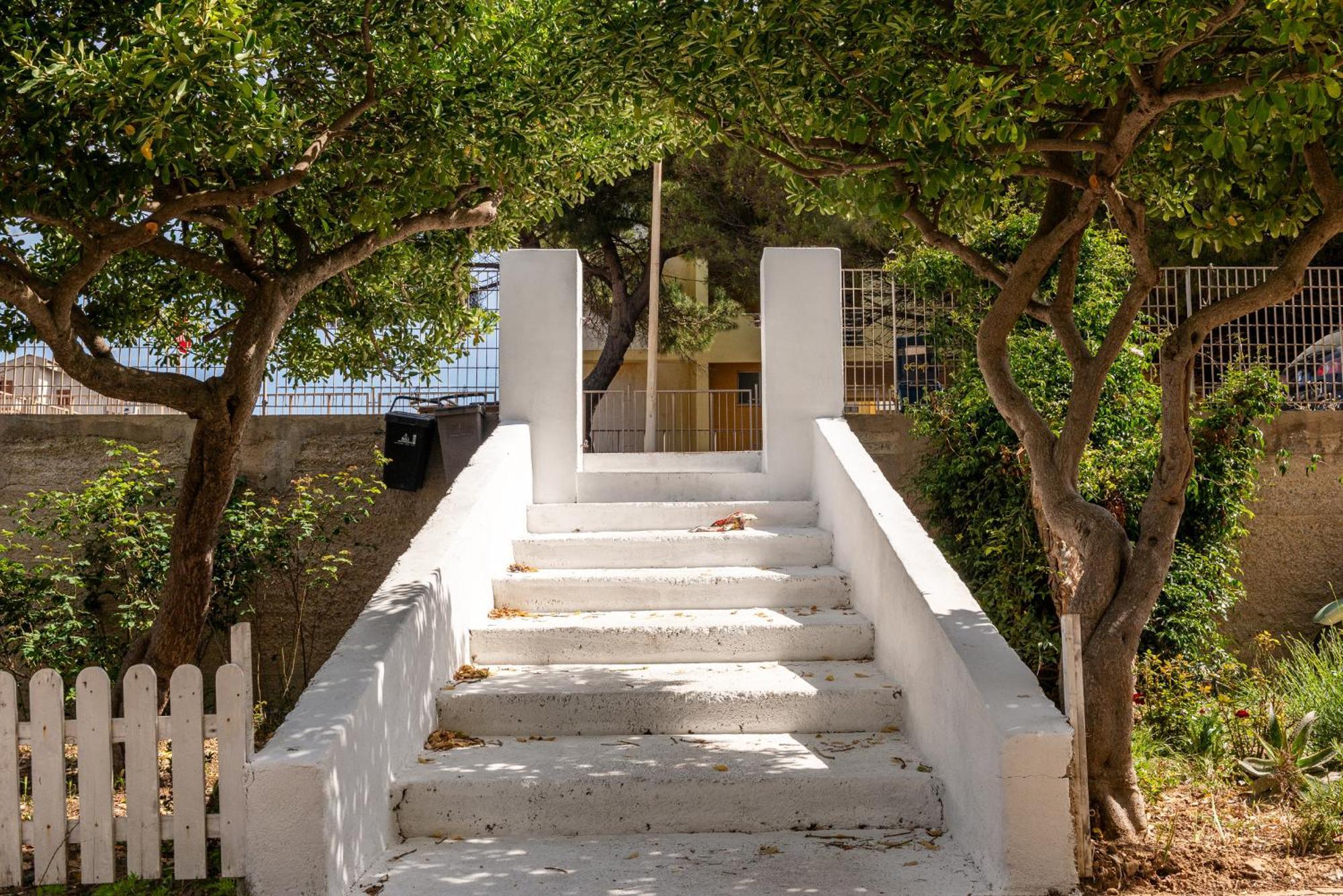 Guest House - Affittacamere Green Apartment - By Faendho Porto Torres Buitenkant foto
