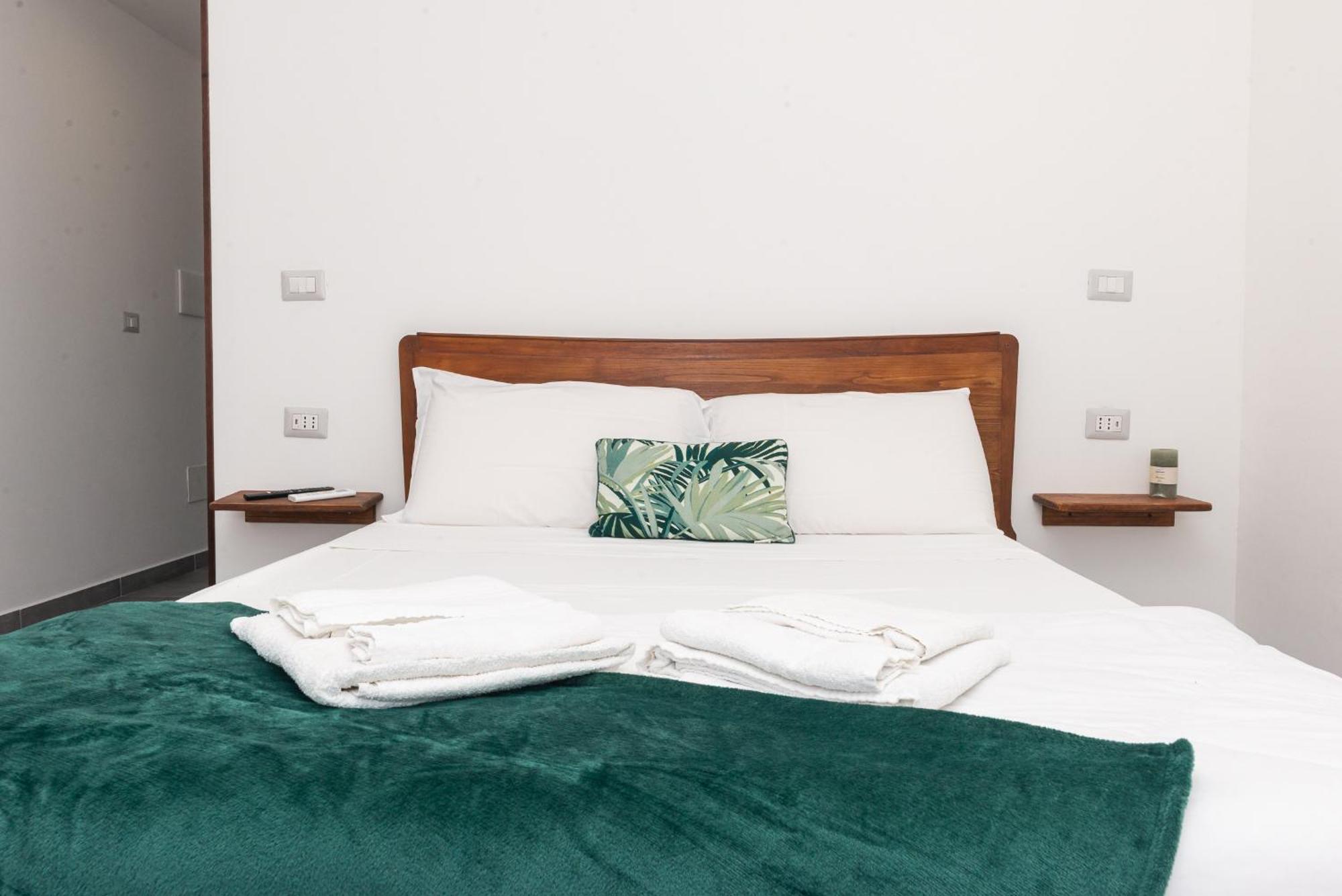 Guest House - Affittacamere Green Apartment - By Faendho Porto Torres Buitenkant foto