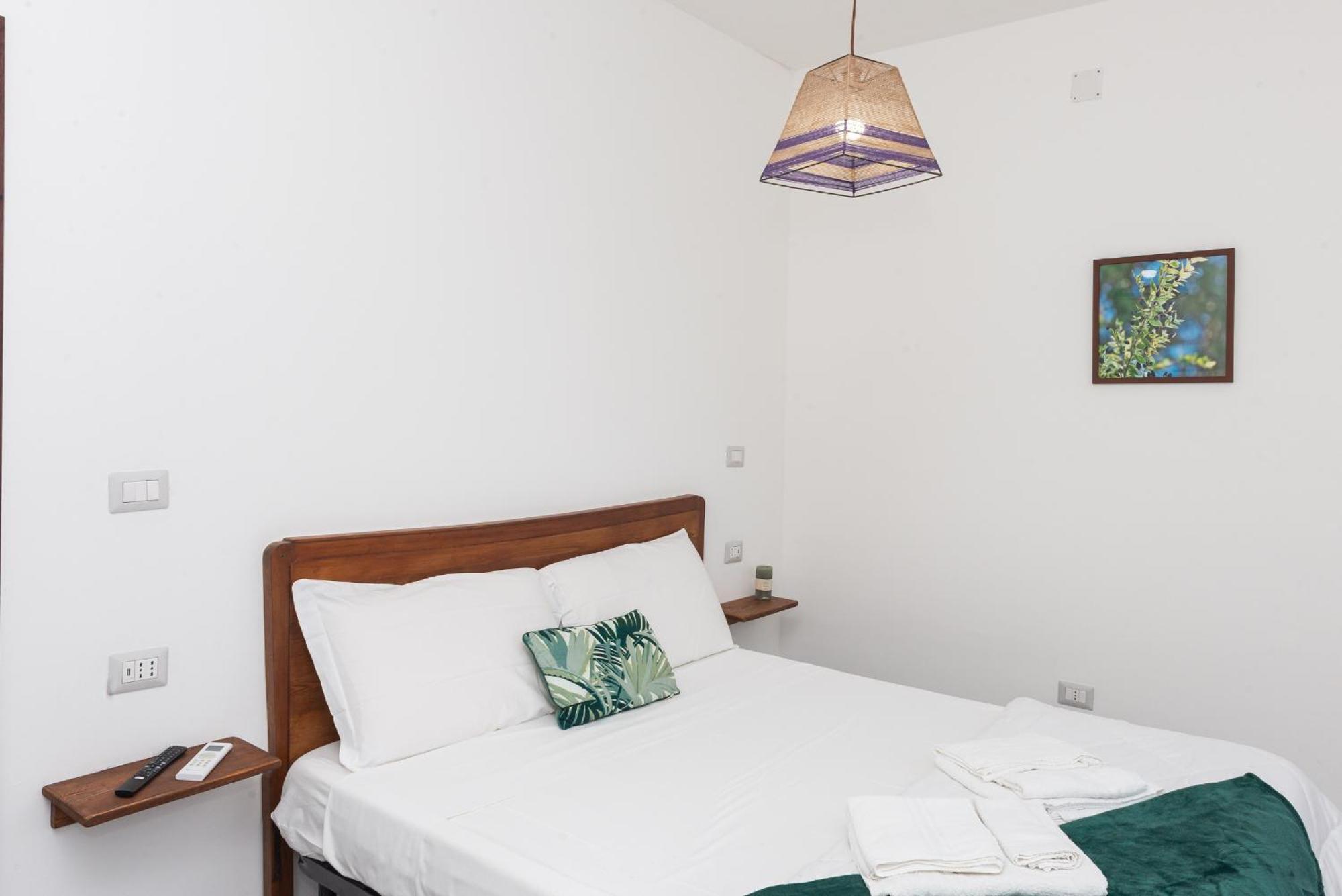Guest House - Affittacamere Green Apartment - By Faendho Porto Torres Buitenkant foto