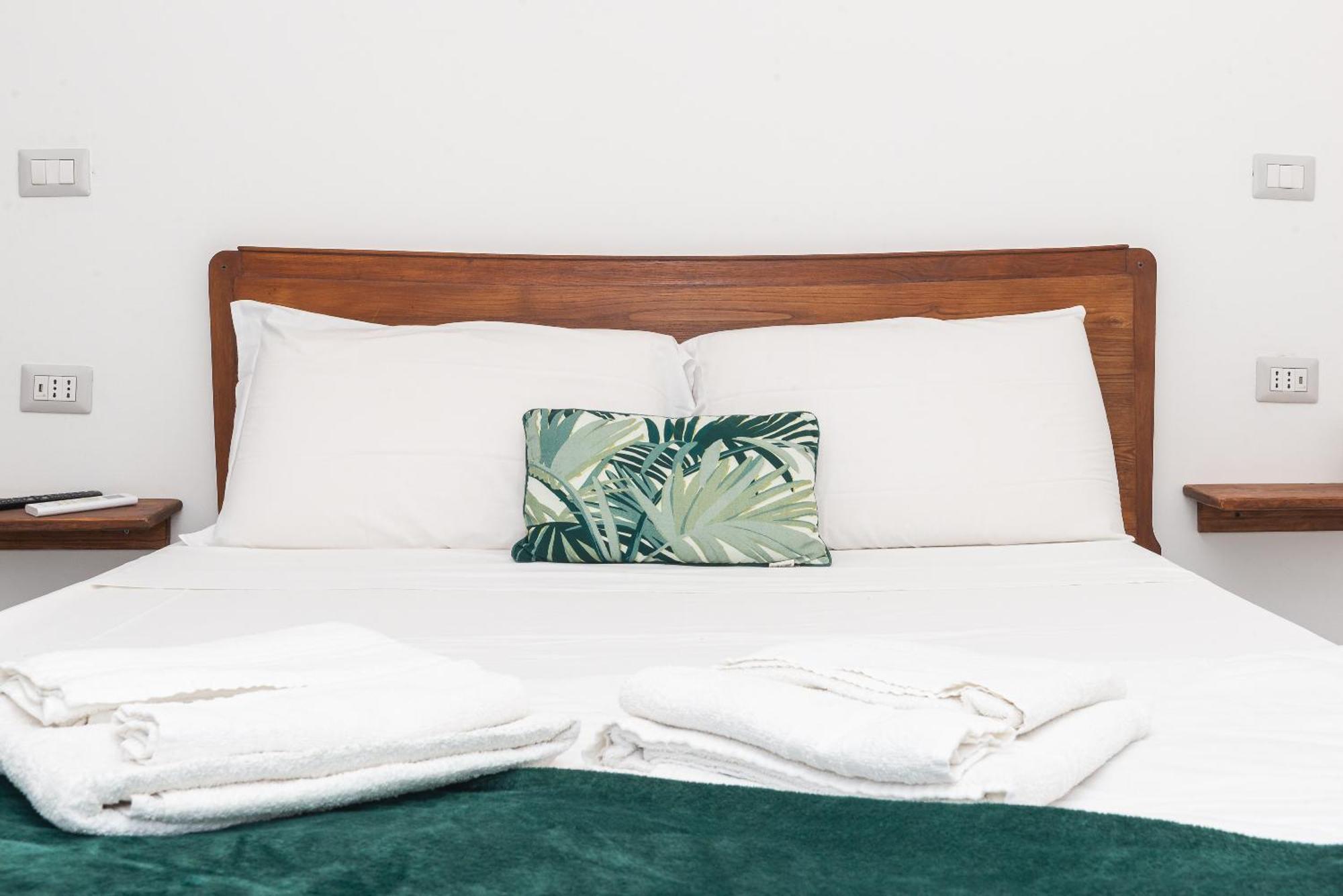 Guest House - Affittacamere Green Apartment - By Faendho Porto Torres Buitenkant foto
