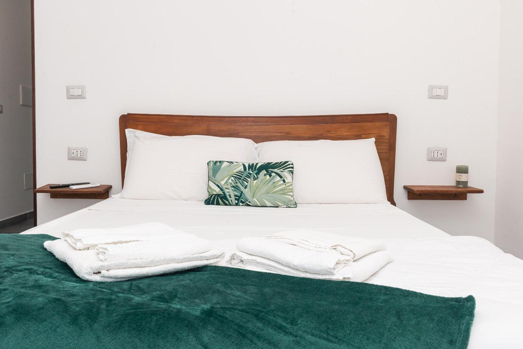 Guest House - Affittacamere Green Apartment - By Faendho Porto Torres Buitenkant foto