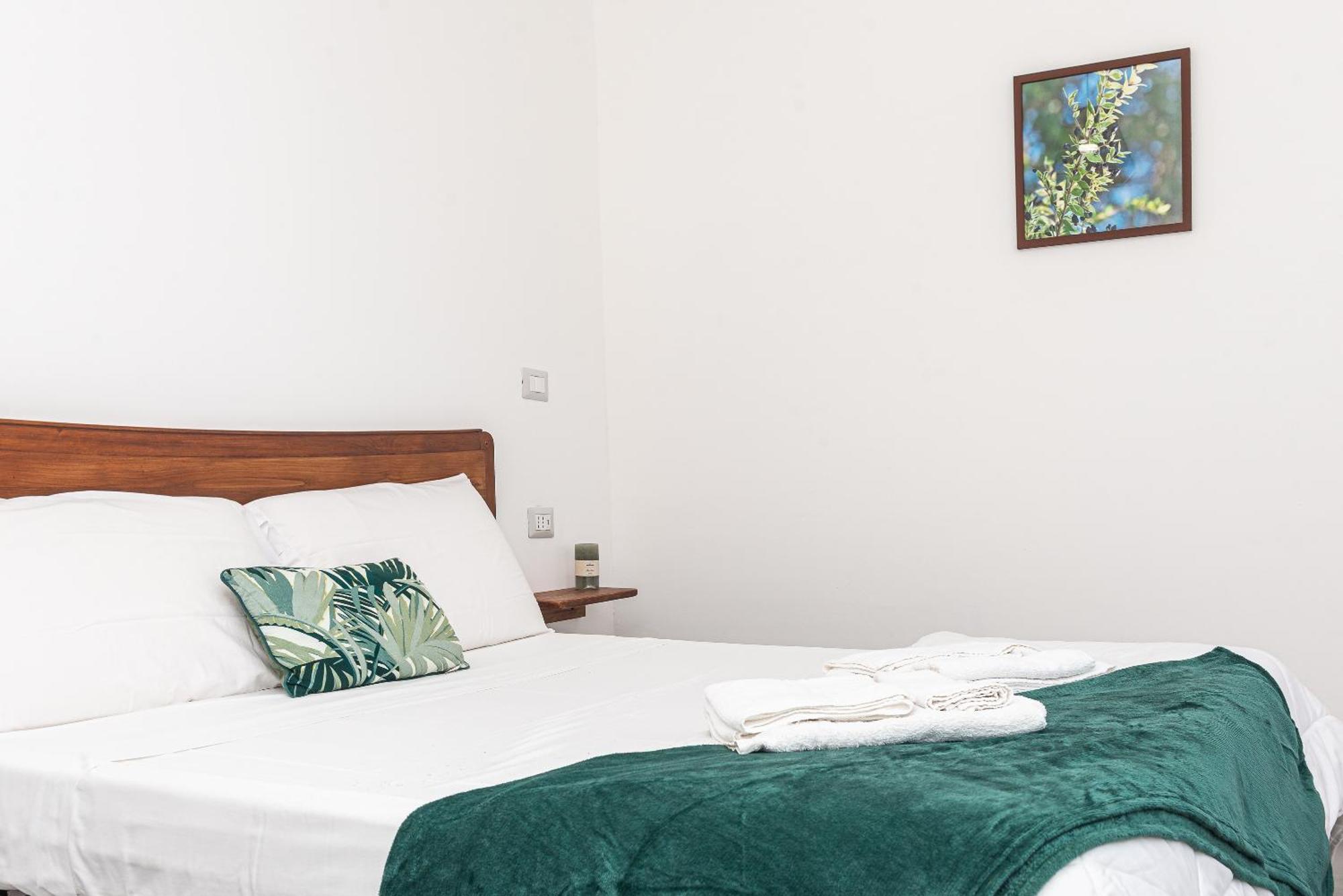 Guest House - Affittacamere Green Apartment - By Faendho Porto Torres Buitenkant foto