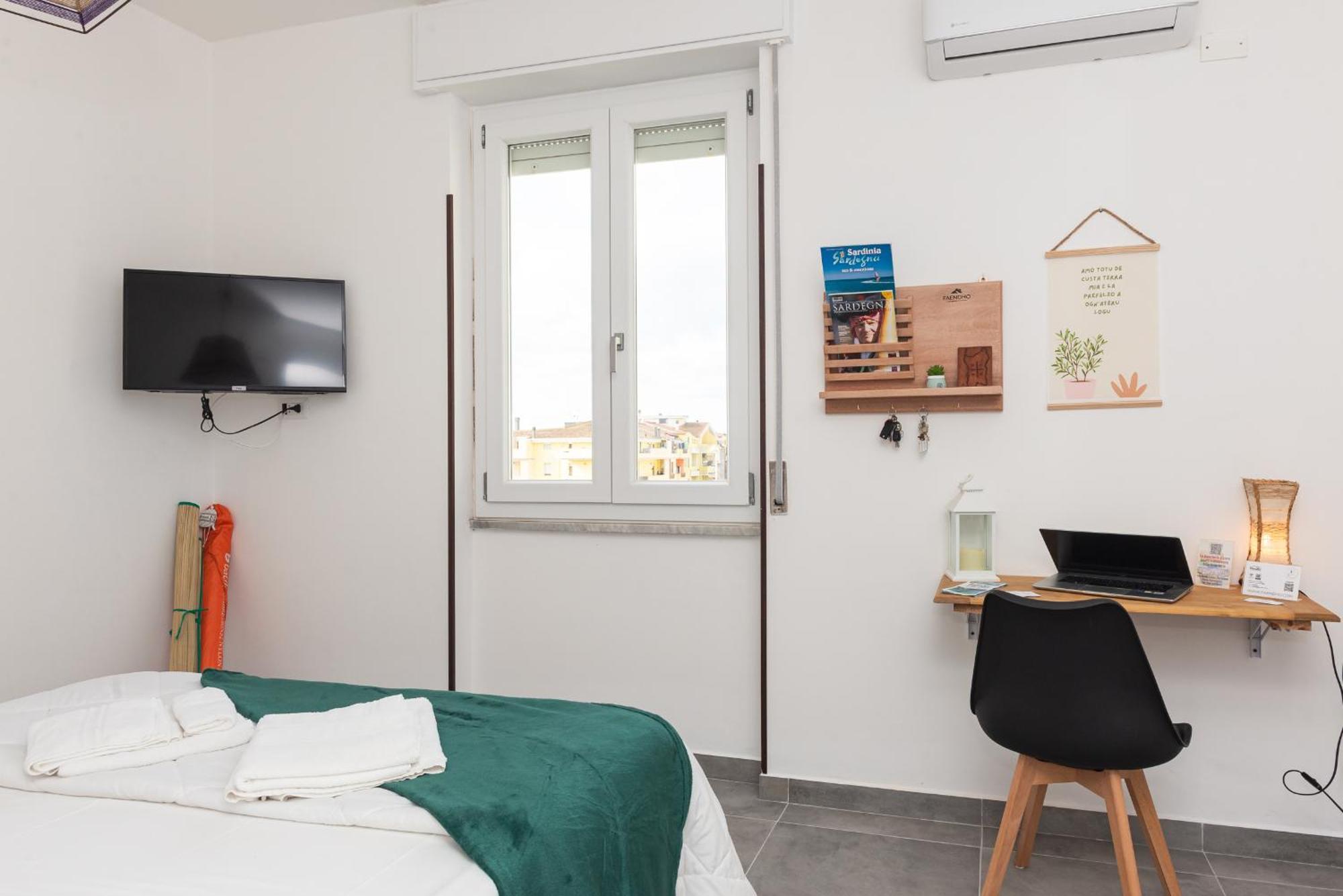 Guest House - Affittacamere Green Apartment - By Faendho Porto Torres Buitenkant foto