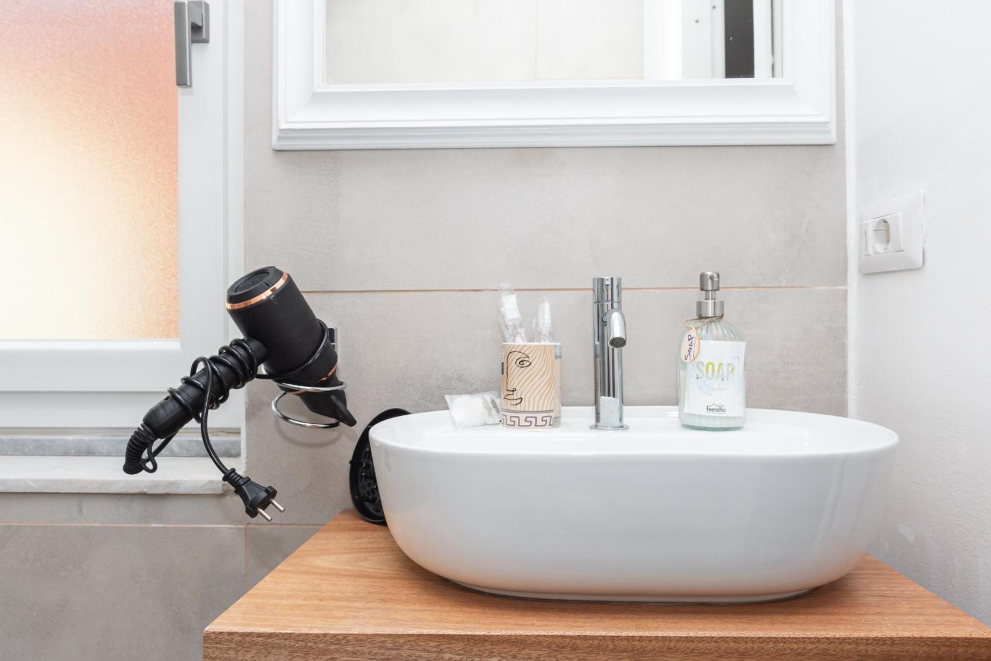 Guest House - Affittacamere Green Apartment - By Faendho Porto Torres Buitenkant foto